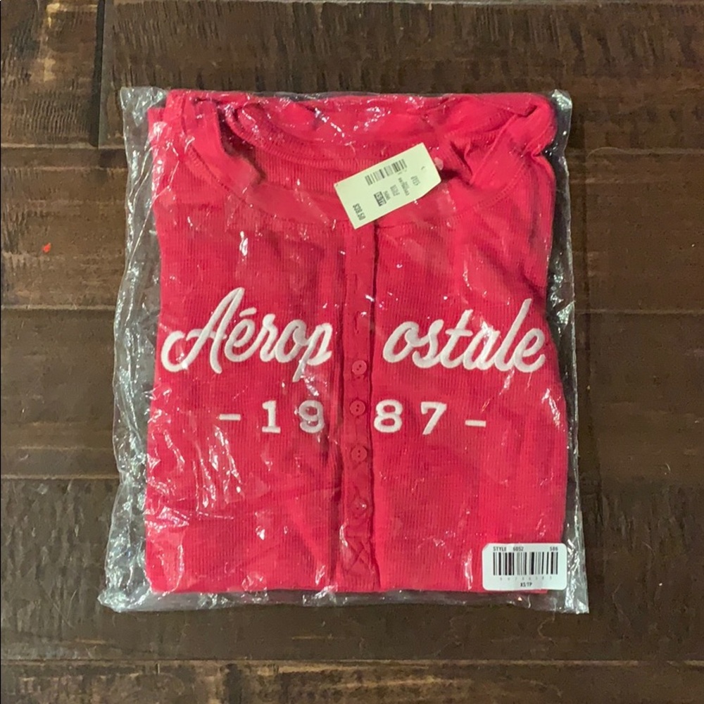 Pink and white Aeropostale skin tight sweater